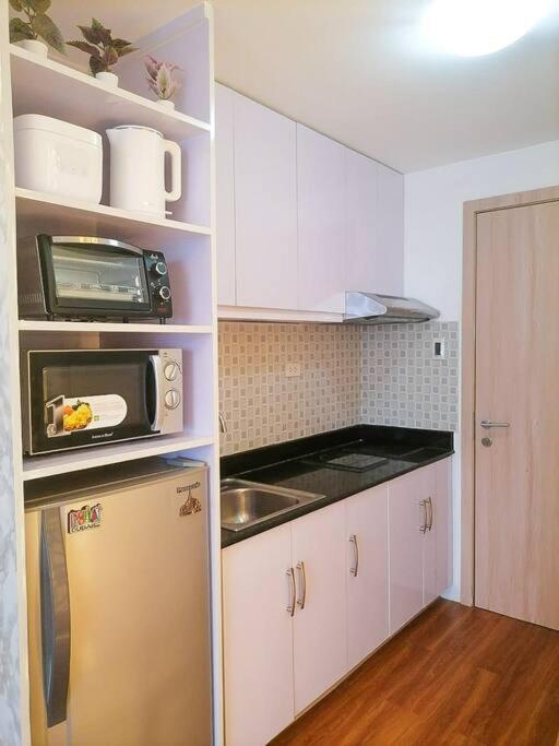 Cozy Studio Unit At Sun Residences Quezon City Exterior photo